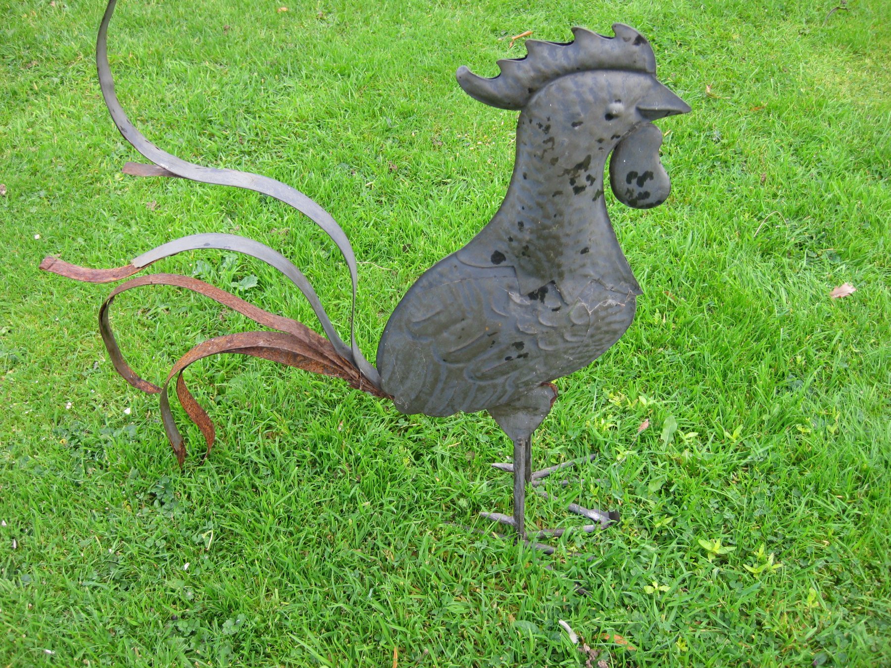a cockerel made from metal